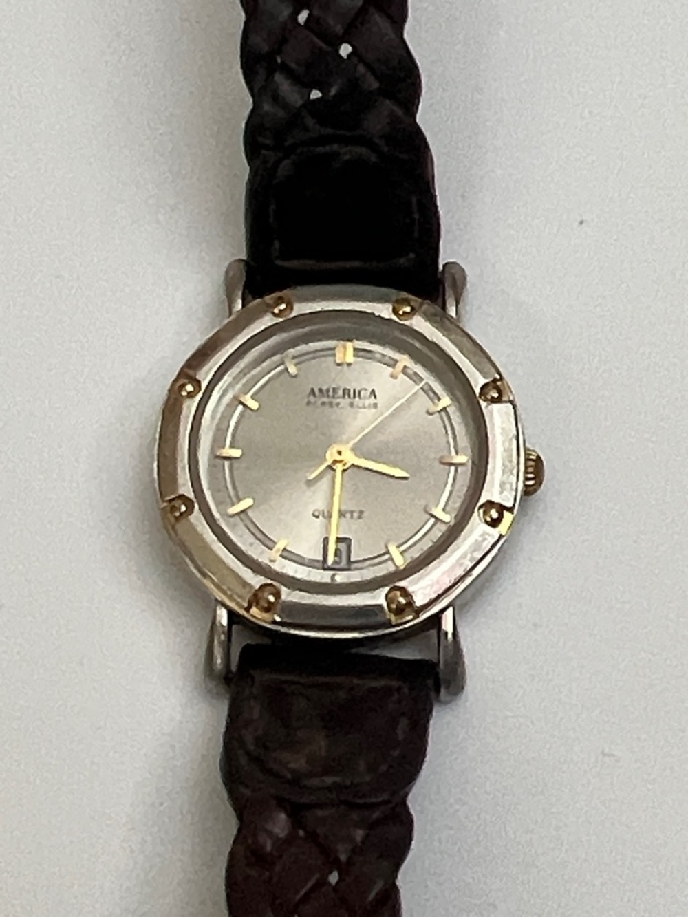 America Perry Ellis watch with brown braided leather band